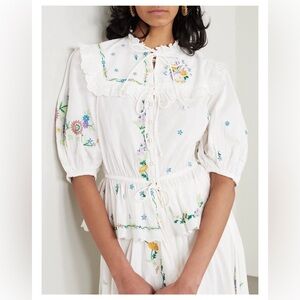 ALÉMAIS
Willa ruffled embroidered organic cotton peplum blouse